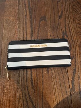 Michael Kors Black and White Striped Zip Wallet with Gold Logo